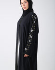 side view of black batwing abaya
