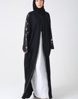 front view of black batwing abaya