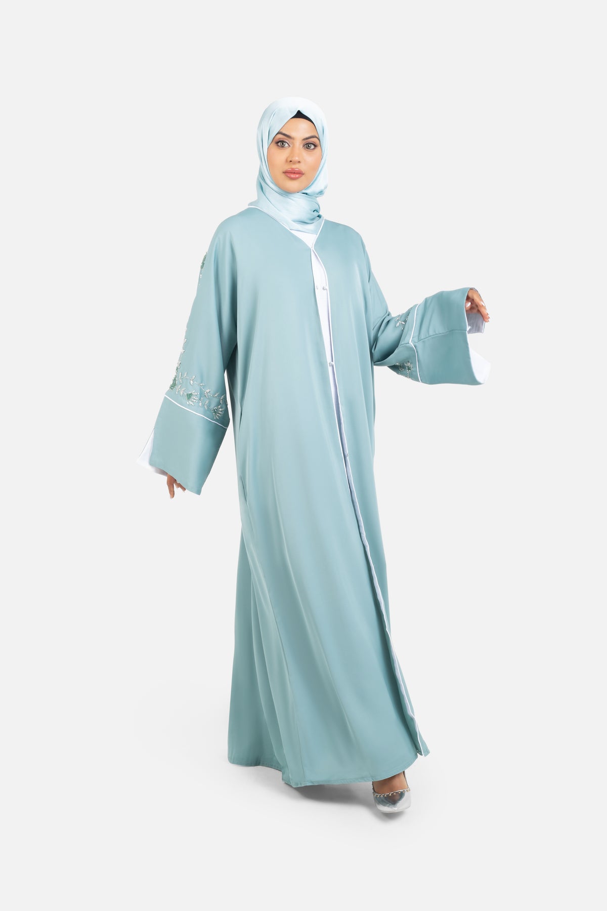 Sage green embellished abaya with split cuffs front view